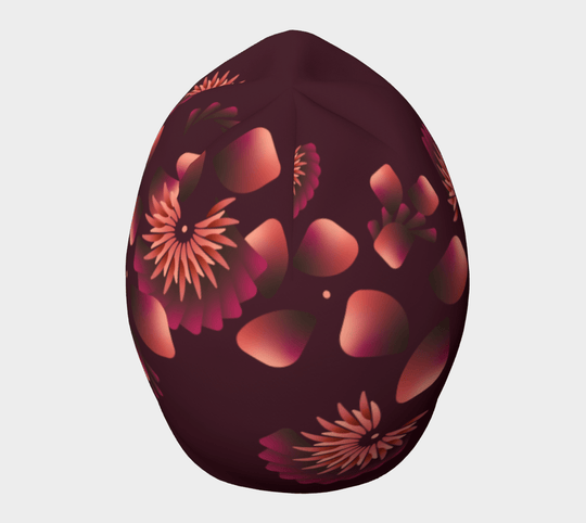 Une tuque marine avec un motif floral éclatant, montrant sa couronne arrondie.