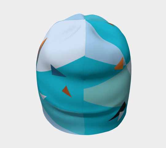 Front view of the Swallow Beanie, showcasing the abstract geometric pattern in shades of blue and orange.