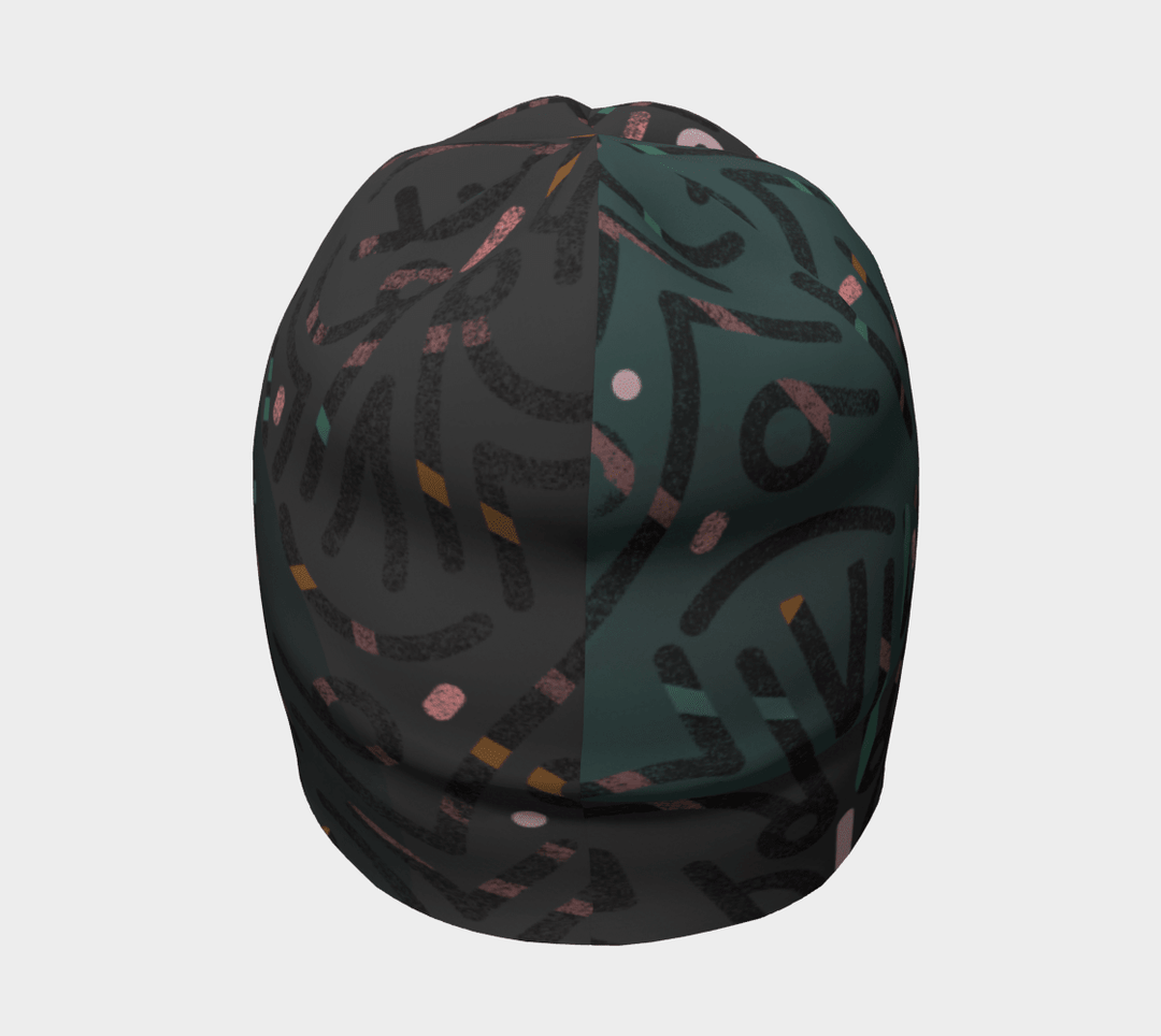 A gray beanie with a split abstract design on a dark background, featuring teal, pink, and orange accents.
