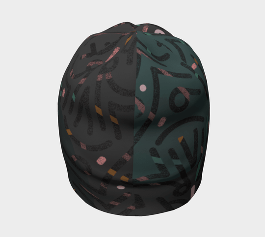 A gray beanie with a split abstract design on a dark background, featuring teal, pink, and orange accents.