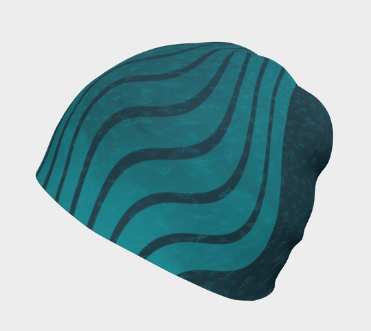 Side view of the Teal Flakes Beanie, showcasing the abstract wave pattern in teal on a dark teal background.