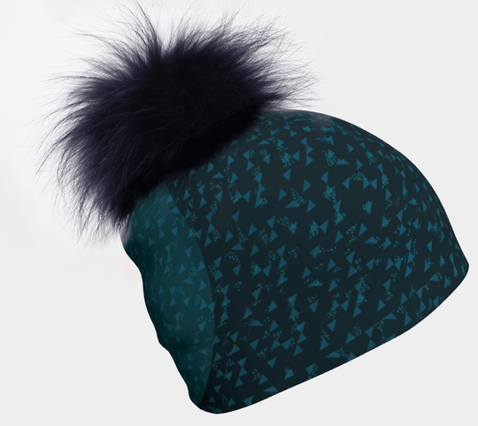 Teal Flakes Beanie with a fluffy navy blue pompom against a white background.