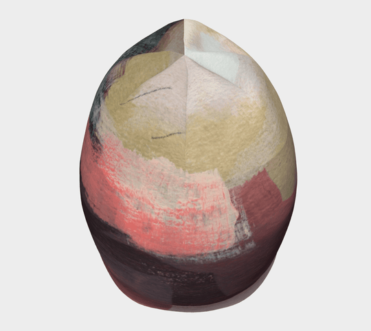 Top view of The Space Between Beanie, displaying a complex abstract design radiating from the crown.