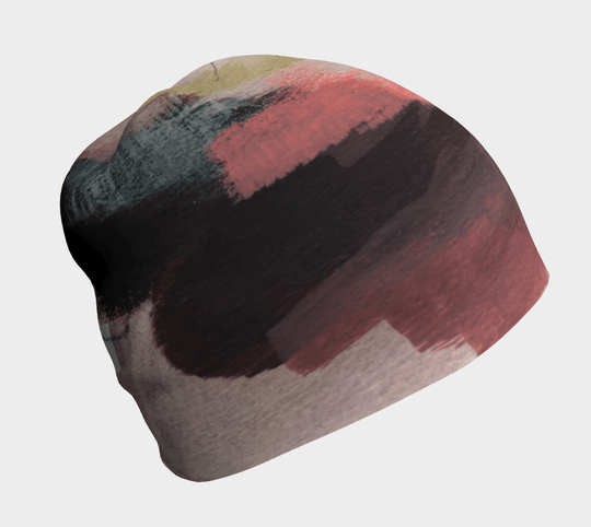 Close-up of The Space Between Beanie, showcasing its abstract brushstroke design in muted tones.