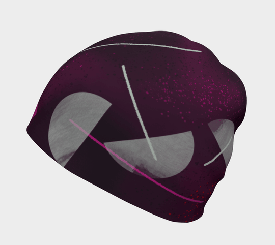 A studio shot of the Umbrella Magenta Beanie, emphasizing its unique abstract design.
