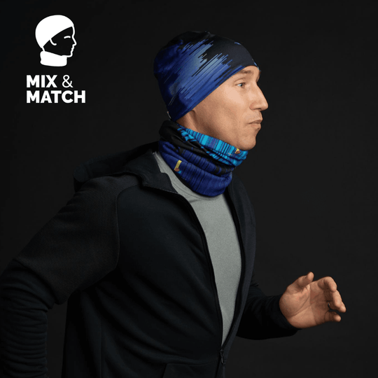 Model wearing the "Black War" beanie and matching neck gaiter for a run, demonstrating mix and match.
