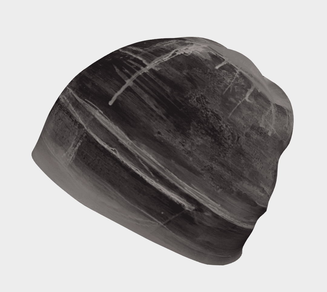 Wall Black Beanie angled side view highlighting the layered grey and black mineral-inspired brushwork across the shell