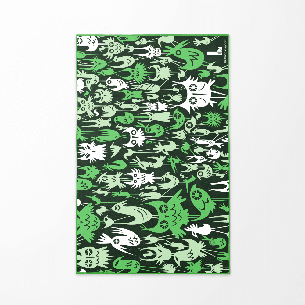 The dark green reverse side of the Wall of Birds towel shown flat, with a repeating pattern of white and light green stylized bird figures.
