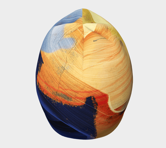 Abstract art beanie with visible brushstrokes in yellow, orange, and blue, shown from the front.