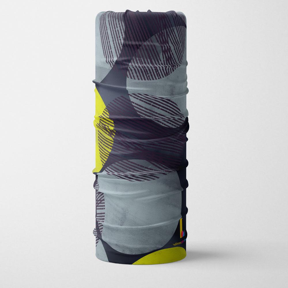 Gray and yellow abstract circles pattern multifunctional neck tube shown from the front, folded