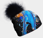 Abstract Black and Blue design and removable pompom makes the Matrix Beanie suitable for any look or any age.
