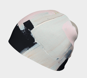 Avec ses tons de rose pâle et noir, le bonnet en bambou Modern Quilt est l'accessoire par excellence pour l'extérieur