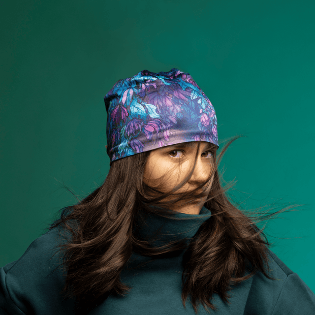 Teenage girl wearing the Purple and Blue Wisteria Sport Beanie by Claire Anghinolfi for the Lalita's Art Shop 25 Collection